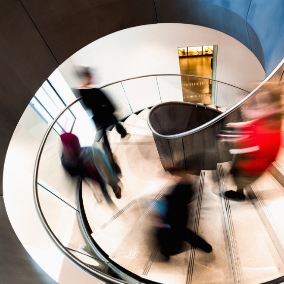 Motion blur people on stairs